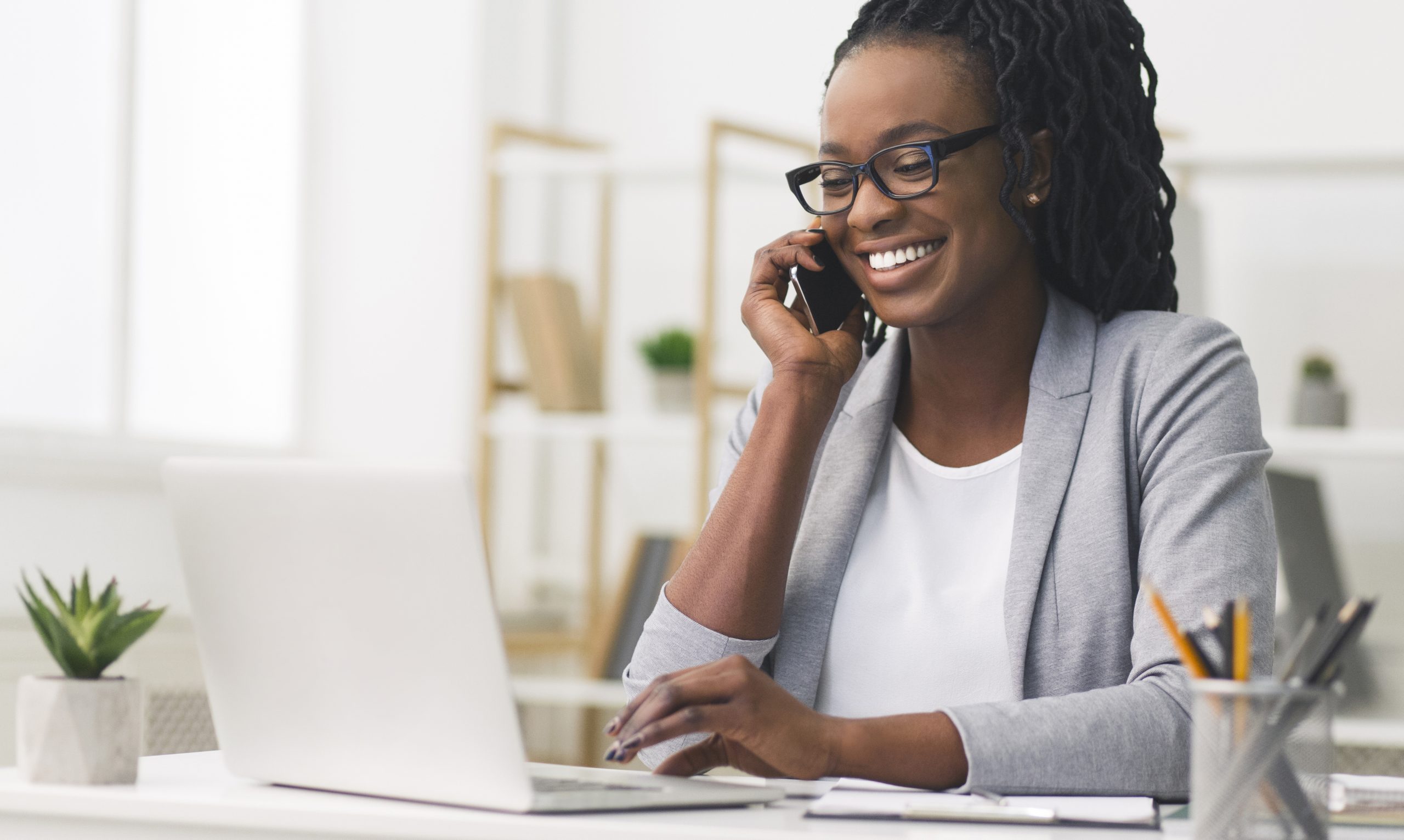 A fundraiser is connecting with a donor on a phone call.