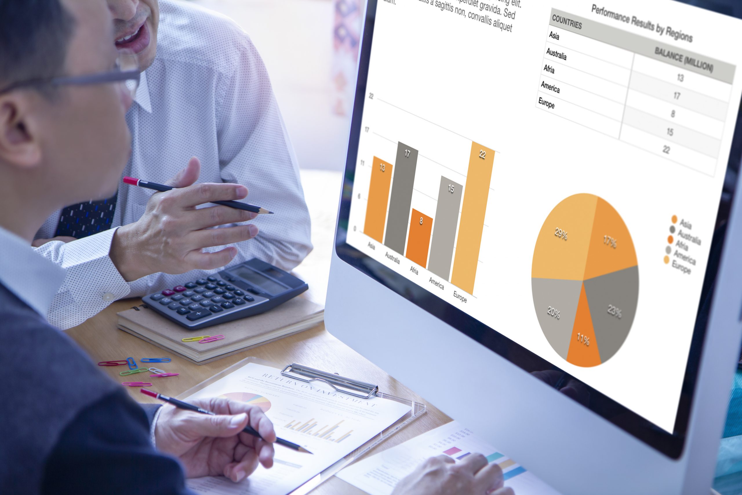 Fundraisers look at a chart showing charitable gift annuity data.