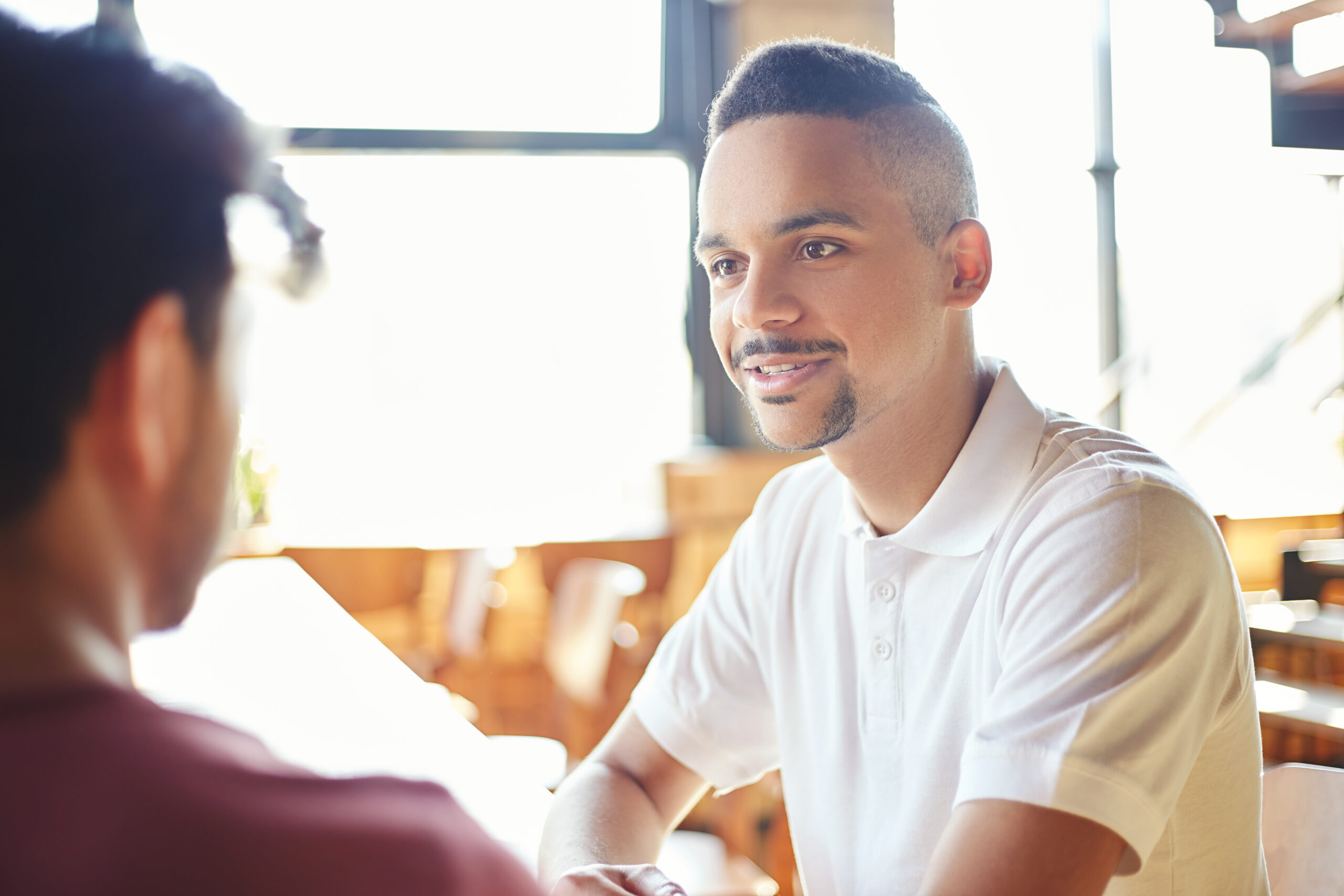 A fundraiser sitting at a table with a donor [Are YOU Afraid to Ask?]