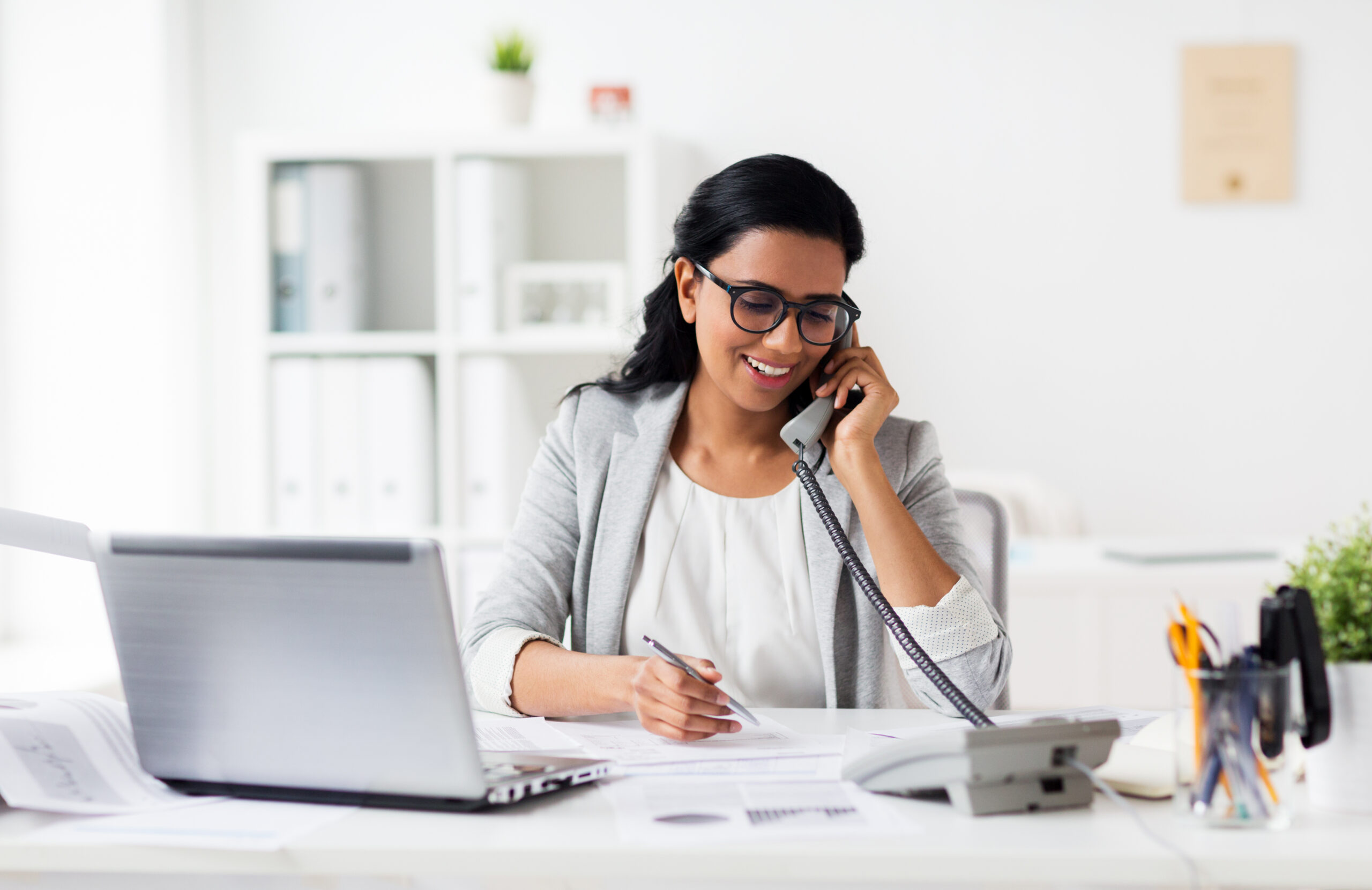 A fundraiser having a conversation with a donor over the phone [Mastering Donor Conversations: A Guide to Purposeful and Meaningful Dialogue]