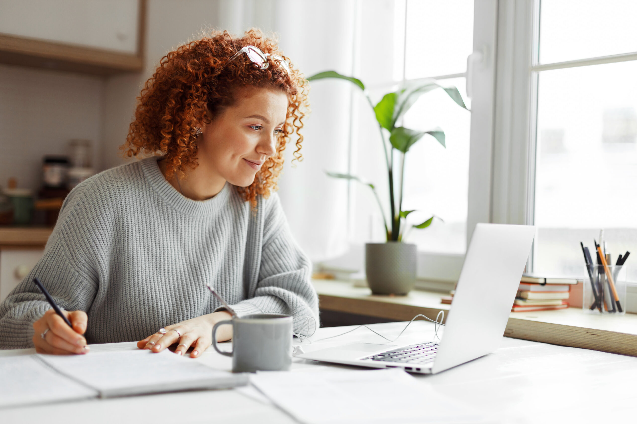 Major gift officer making plan at computer. [Want the Most Flexibility in Your Work? Have a Plan]