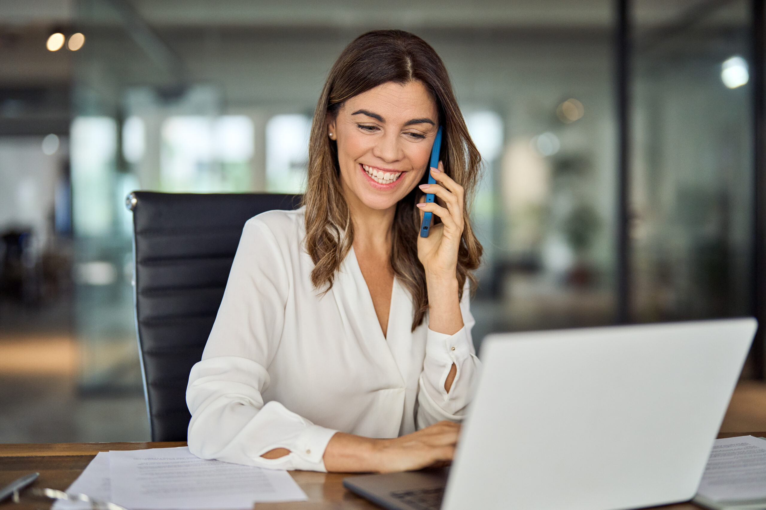 A fundraiser speaks to a donor on the phone [What Does the New Phone Etiquette Mean for Your Donor Calls?]