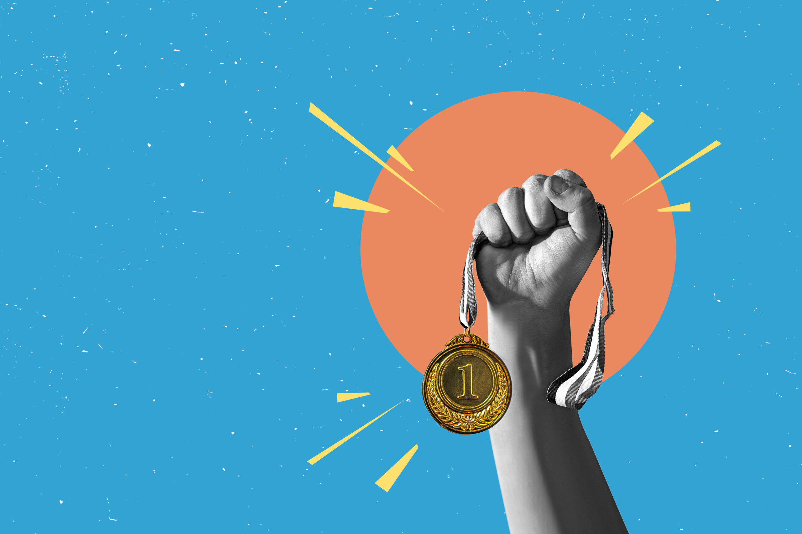 A hand holding a gold medal [What It Means to Win in Fundraising: Lessons from the Olympic Games]